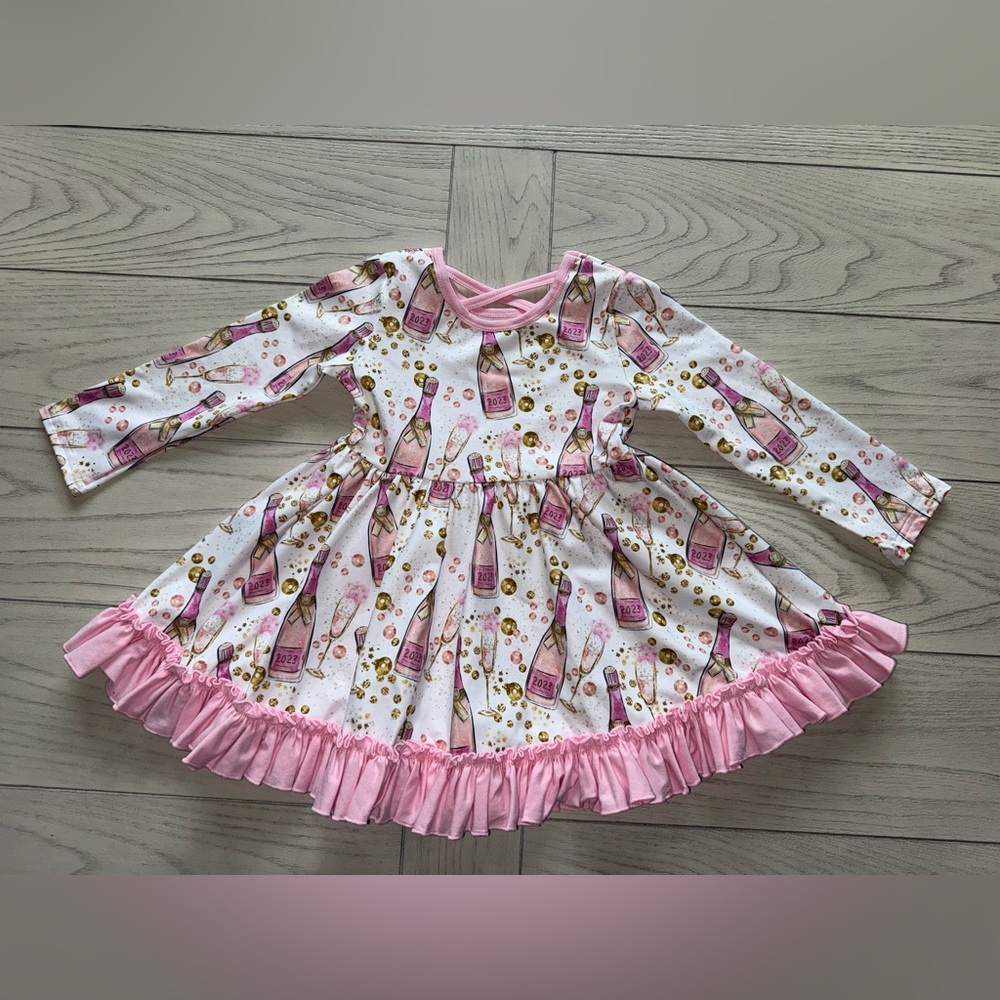 New Years Pink and White Long Sleeve Dress with Bottle Print